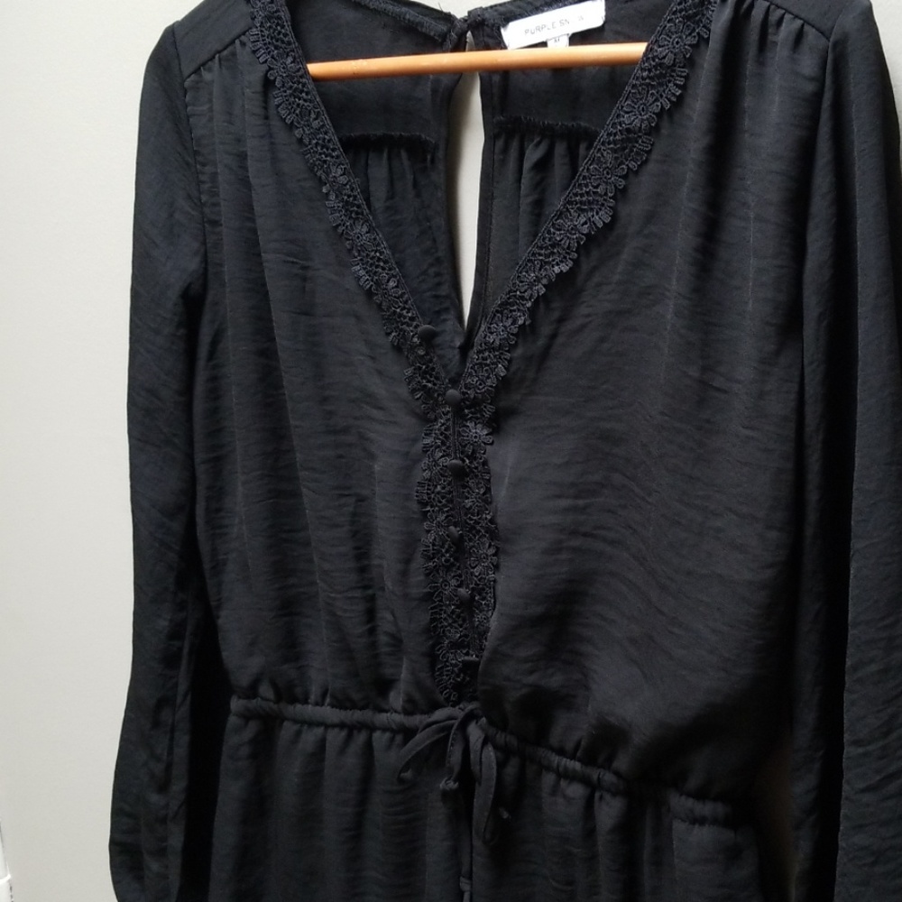Black shorts romper with lace and bell sleeve